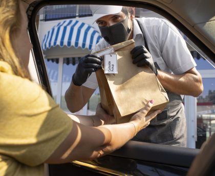 man giving an order for a curbside pickup